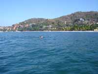 Denise swims to shore